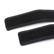 Polsiere nere con bordo curvo e interno velcro a pelo corto