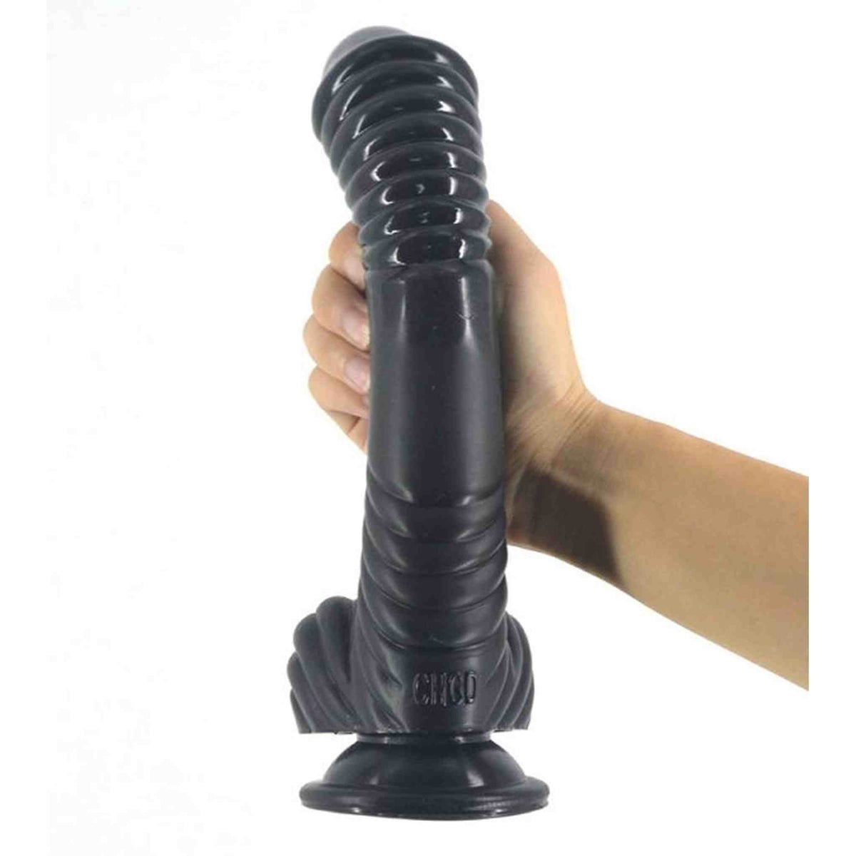 Plug anale nero curvo rigato CHICCO tenuto in mano