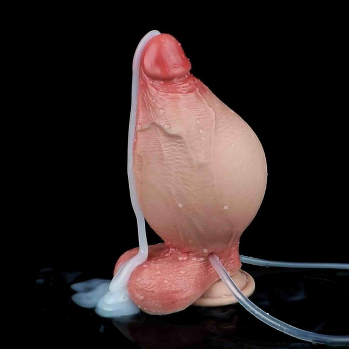 Dildo gonfiabile che spruzza liquido bianco con tubi trasparenti e superficie bagnata