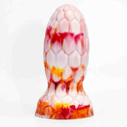 Dildo bianco con striature rosse e arancioni texture scaglie esagonali