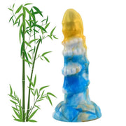 Statuetta mostro mitologico bianco strati blu giallo finitura lucida con bambù