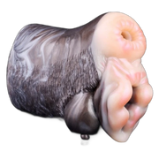 Dettaglio testa capra bocca a spirale e protuberanze laterali silicone morbido