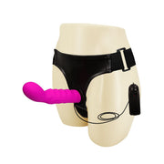 Strapon vibrante rosa in silicone con telecomando e supporto in similpelle nero