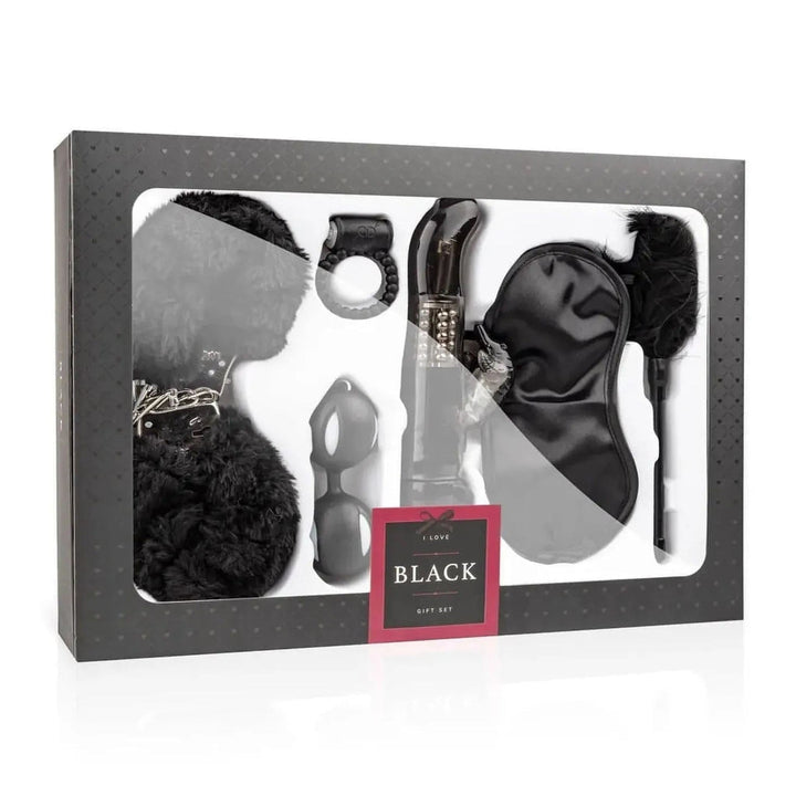 Scatola regalo nera con finestra per 6 accessori BDSM: manette, vibratore e frusta piume