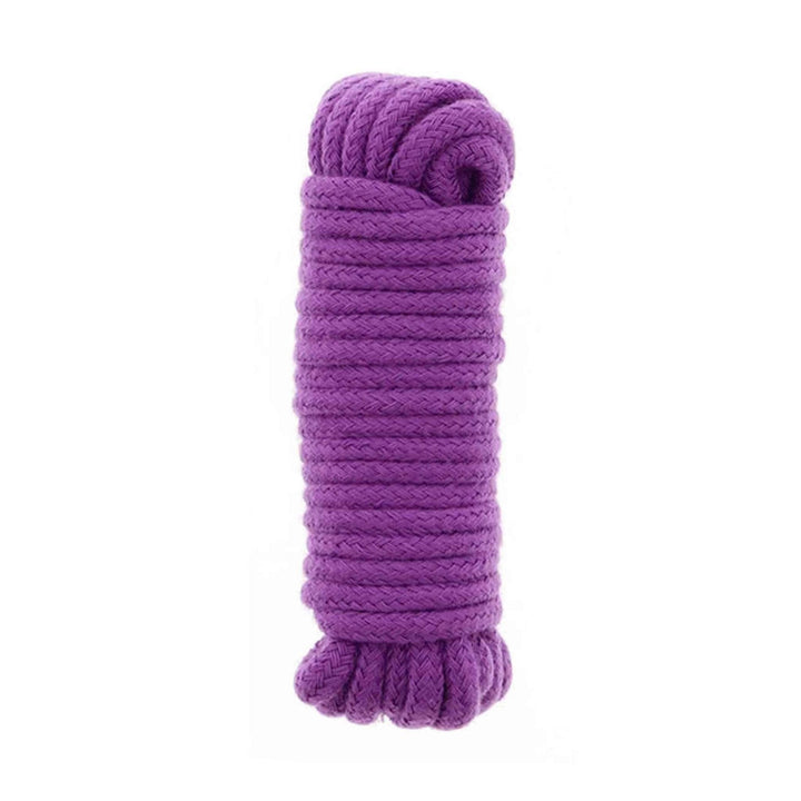 Corda da bondage intrecciata viola BondX vista ravvicinata su sfondo bianco