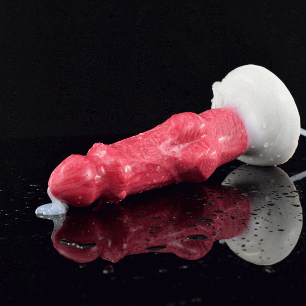 Dildo Bonewolf Damon in silicone rosa venato su superficie nera lucida