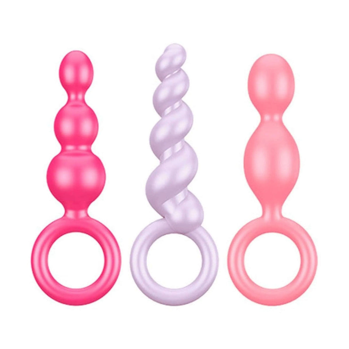 Set di tre plug anali pastello Satisfyer Booty Call, colori rosa acceso, viola chiaro e rosa pallido con base anulare