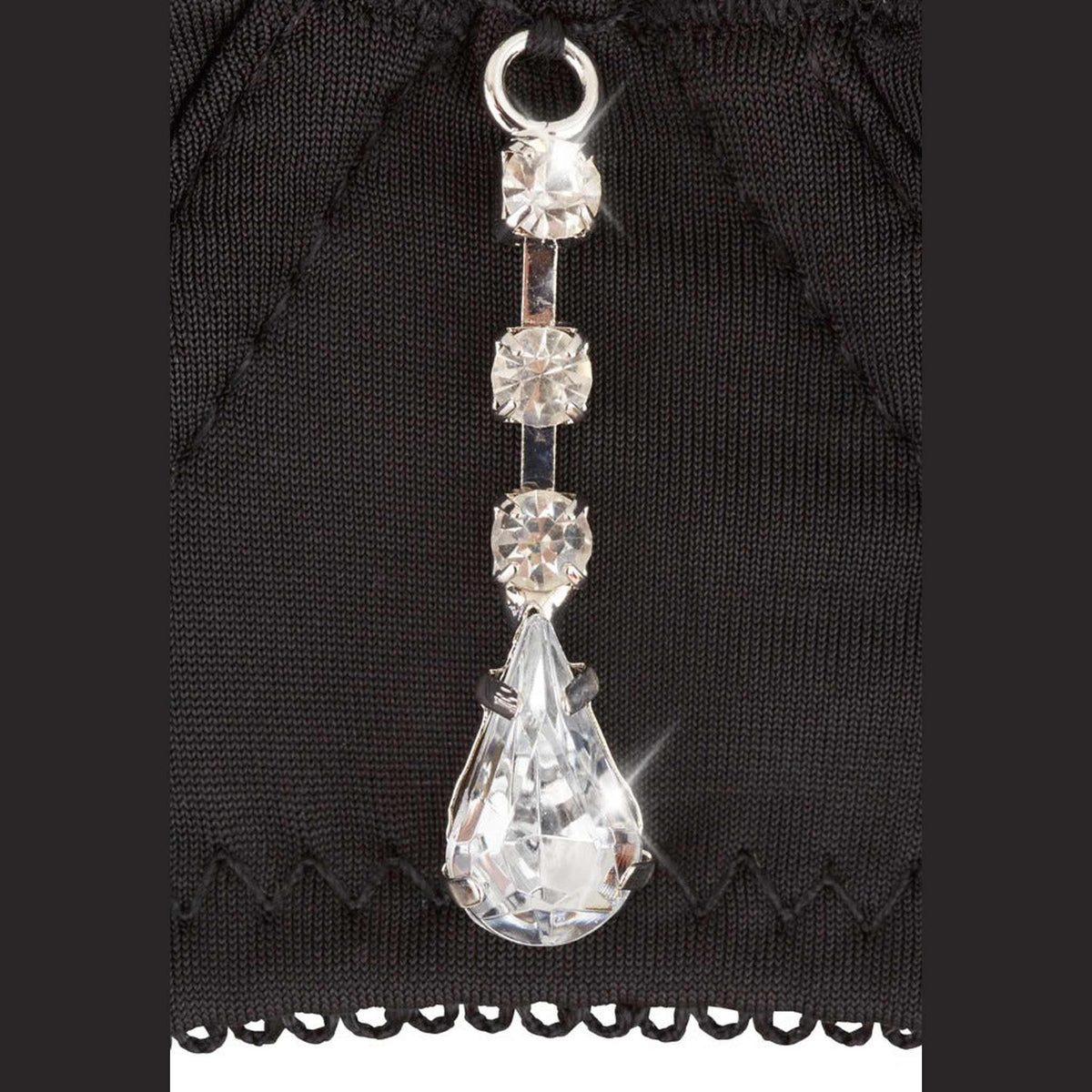 Dettaglio bustier lingerie nera con strass rotondi e goccia incastonati metallo argentato