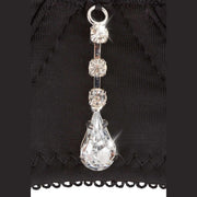 Dettaglio bustier lingerie nera con strass rotondi e goccia incastonati metallo argentato