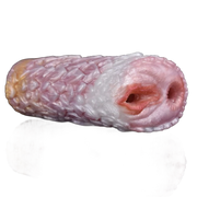 Vista frontale dildo Camellia con finitura a petali sovrapposti e doppie aperture carnose