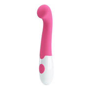 Vibratore rosa a forma di bacchetta con pulsante circolare sulla base