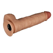 Vista laterale dildo vibrante carnoso texture pelle con testicoli
