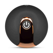 Telecomando circolare nero per ovetto vibrante con pulsante illuminato e bordo dorato