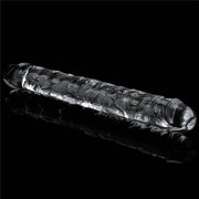Vista laterale dildo trasparente TPE a due teste con superficie scolpita su sfondo nero