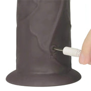 Primo piano ricarica magnetica porta DC su base dildo vibrante nero in silicone flessibile
