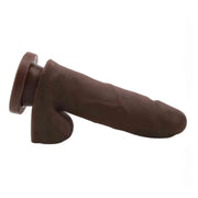 Dildo marrone opaco profilo laterale con ventosa integrata
