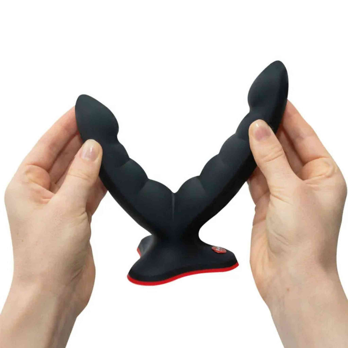 Dildo Fun Factory Ryde nero a doppia testa in silicone con texture ondulata e base ventosa rossa
