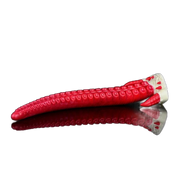Dildo silicone rosso allungato con ventose circolari e base decorata