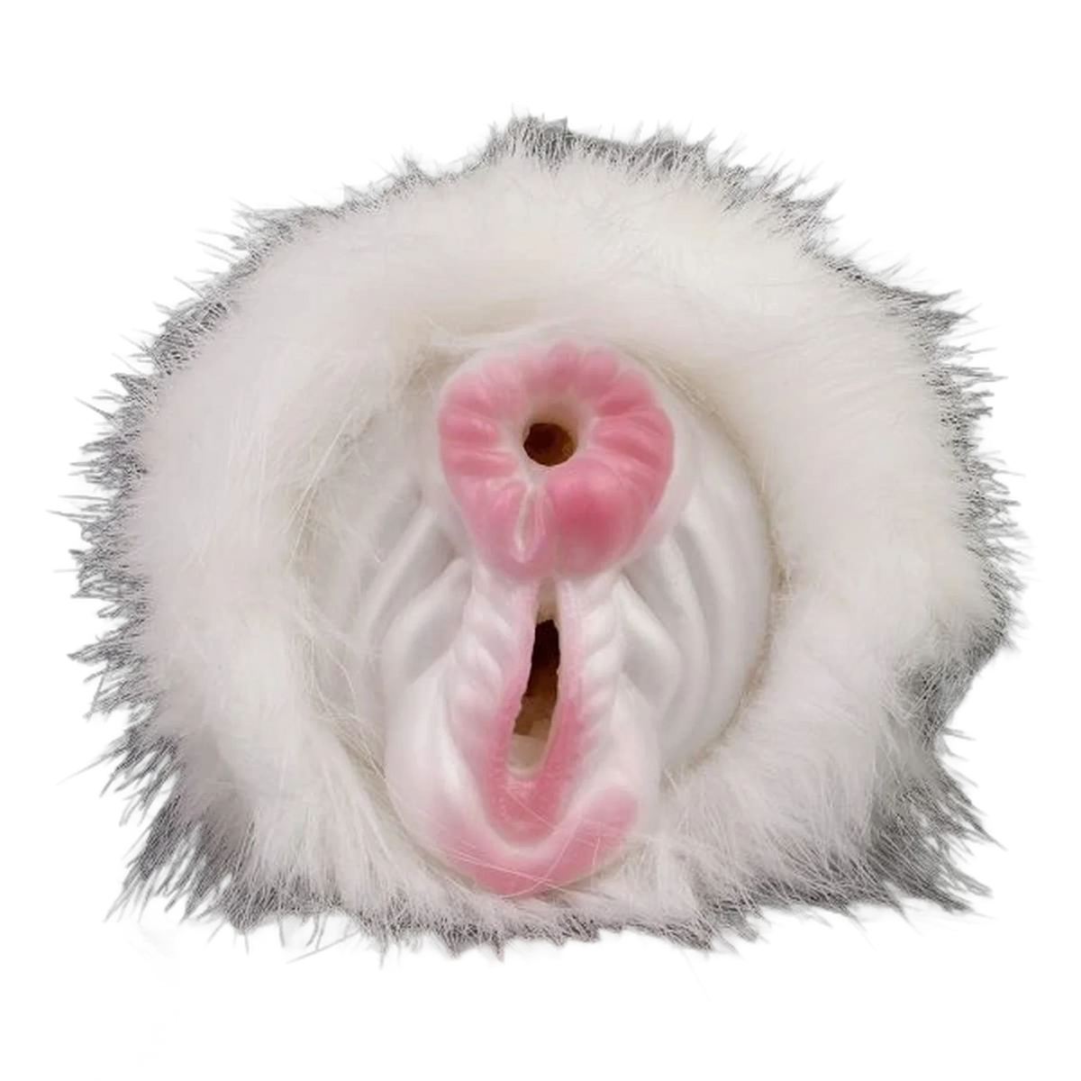 Dettaglio apertura superiore circolare e inferiore a fessura su giocattolo in silicone rosa