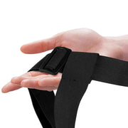 Imbracatura strapon nera con fibbia plastica e cinghie elastiche per adattamento corpo