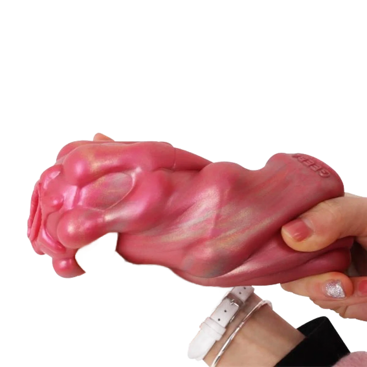 Masturbatore Jagged Bones rosa in silicone liquido con finitura iridescente e logo Magmara
