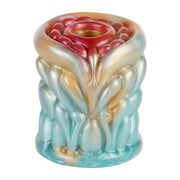 Vista dall'alto petali rossi masturbatore silicone liquido blu fiamma