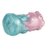 Toy silicone liquido gradiente turchese rosa con dettagli tentacoli e texture floreale