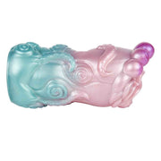 Toy silicone liquido forma polpo gradiente blu ciano rosa viola con dettagli tentacoli