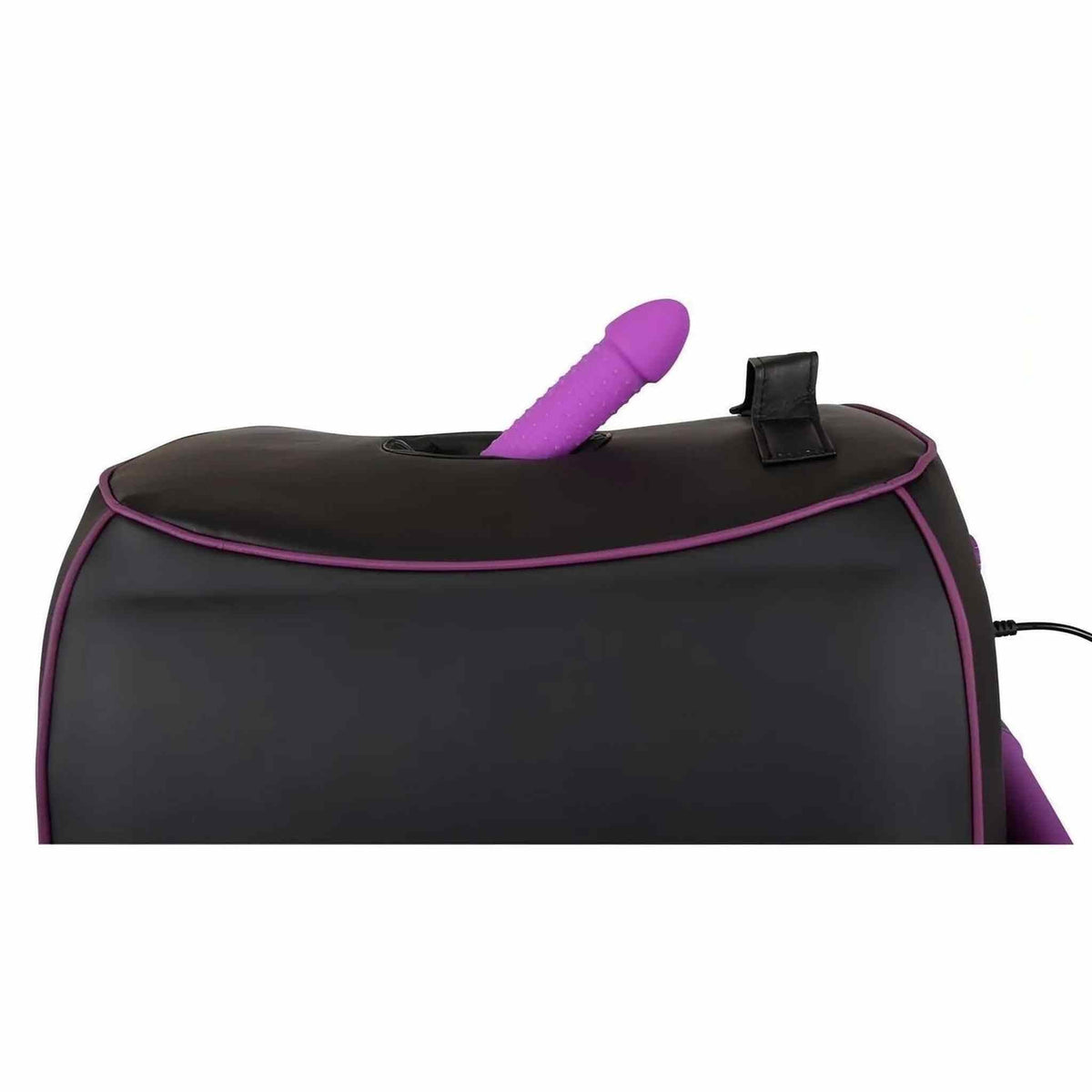 Adattatore in silicone viola a puntini inserito nella custodia di trasporto nera della macchina vibrante