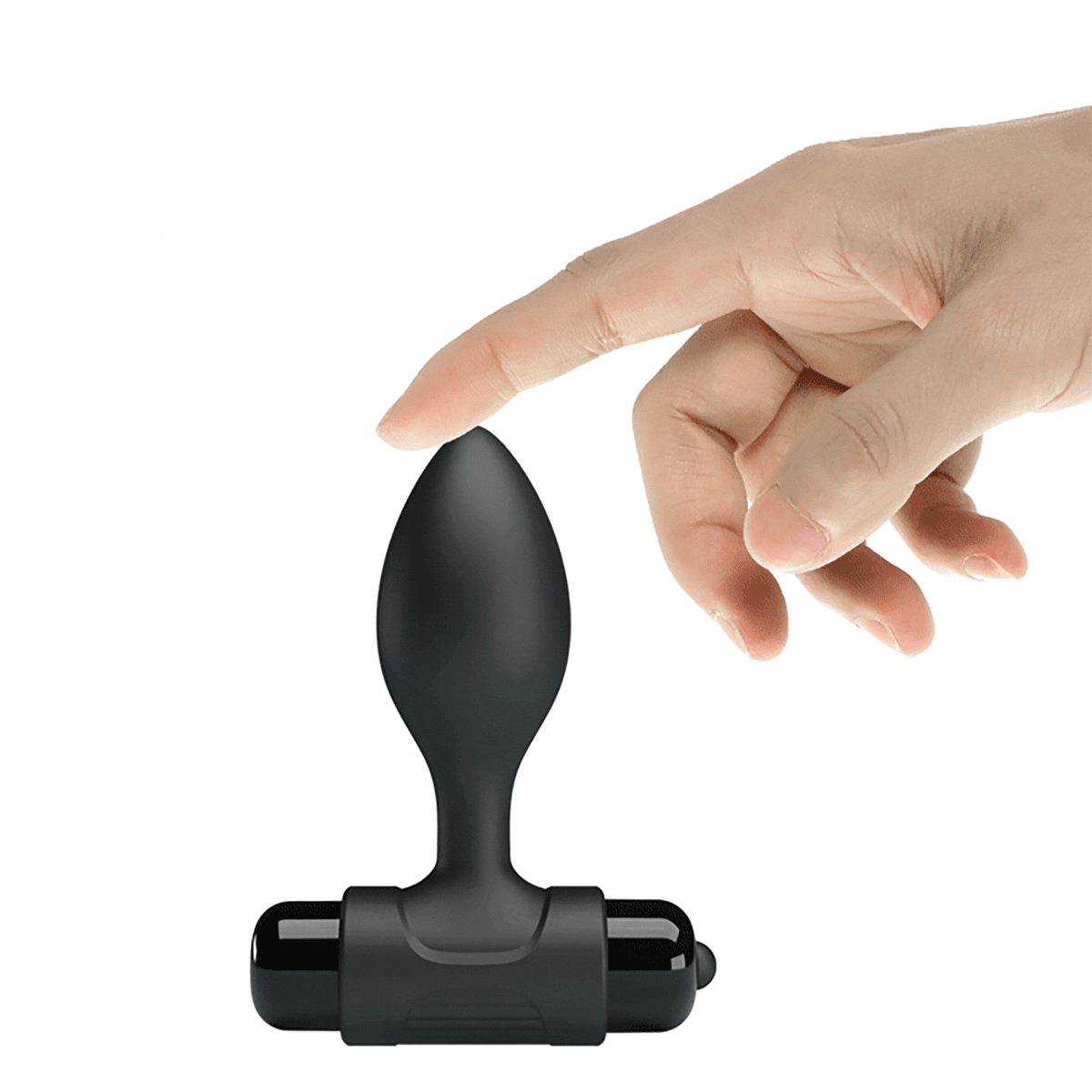 Mano che preme punta plug anale nero in silicone per test flessibilità