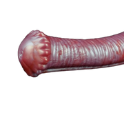 Profilo laterale dildo rosa Srepnia con testa a zampa animale e righe orizzontali