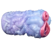 Vista laterale orizzontale masturbatore Octopus Orana apertura anatomica rosa e superficie tentacolare
