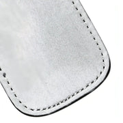 Paddle a doppia faccia argento lucido con cuciture bianche e texture granulosa