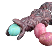 Pandora Ovipositor aperto con lobi e uova turchesi e rosa inserite
