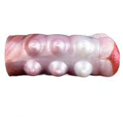 Toy masturbazione Petal Fairy in silicone liquido rosa con protuberanze sferiche