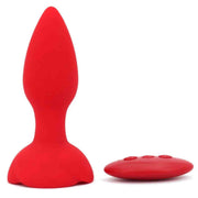 Plug anale rosa silicone frontale con telecomando a tre pulsanti ovali
