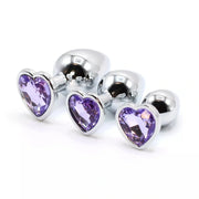 Plug anale in metallo lucido con cuore Swarovski viola e base sferica