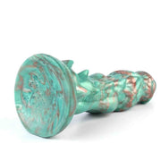 Dildo drago verde acqua base circolare vista laterale dettagli muscolari e scaglie