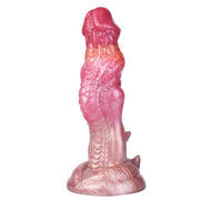 Dildo drago rosa arancione iridescente vista laterale testa arrotondata scaglie