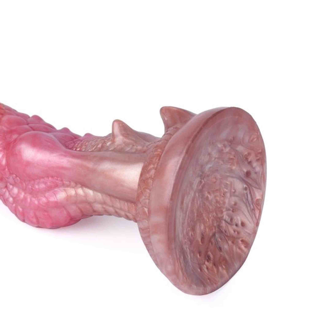 Dildo drago rosa beige base circolare vista ravvicinata scaglie incise finitura opaca
