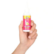 Lubrificante gustoso banana CumFace bottiglia da 80 ml etichetta rosa e gialla