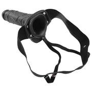 Vista dall'alto di strap-on nero con base circolare e cinghie regolabili
