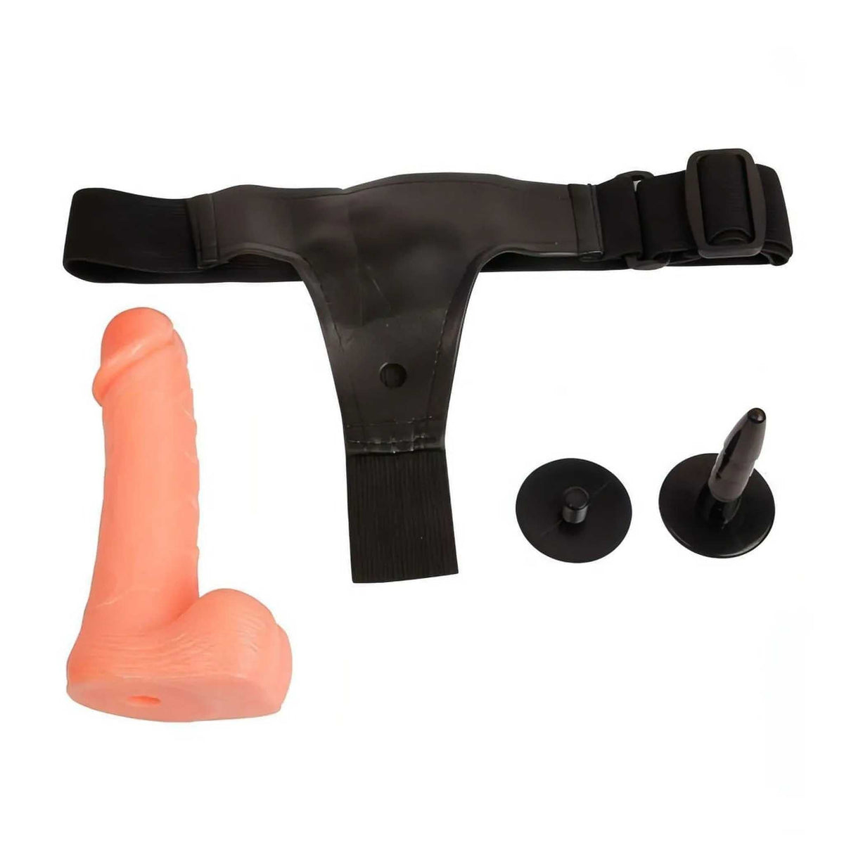 Kit strap-on completo: dildo TPR, cintura nera e adattatori su sfondo bianco