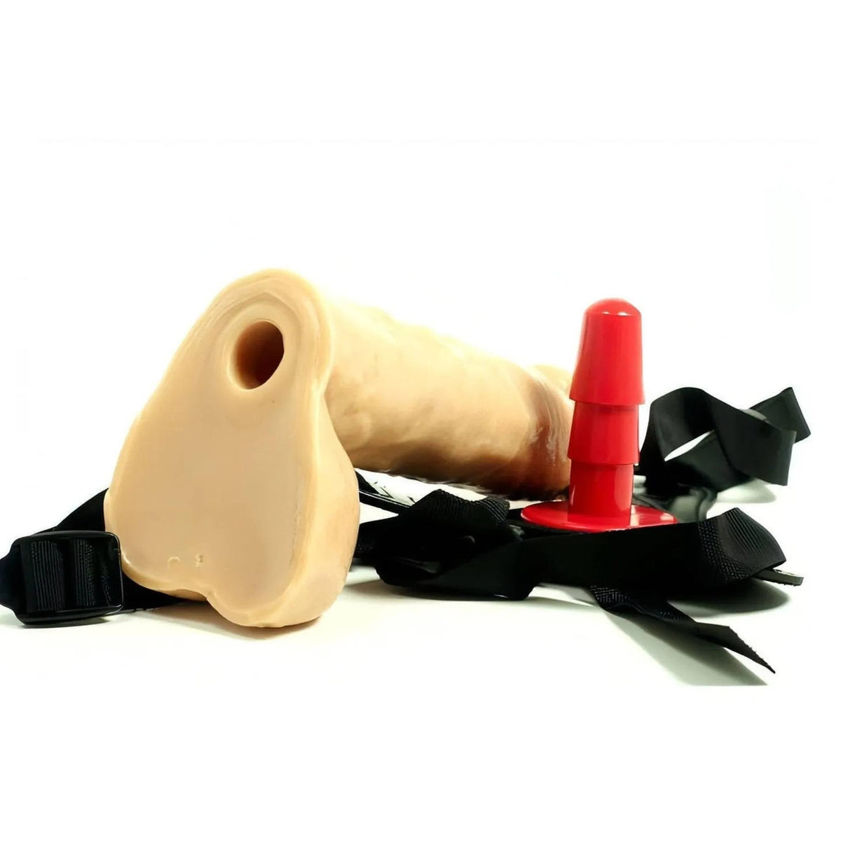 Strap-on fallo realistico rosa carne con cinturino nero e accessorio rosso