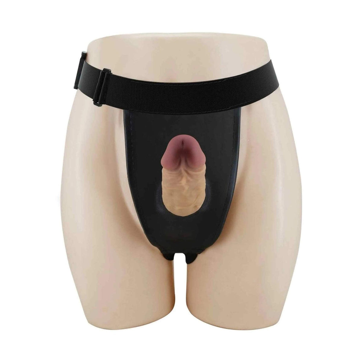 Strapon vuoto nero indossato su manichino con pene in silicone inserito verticalmente