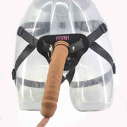 Dildo Strapons 24cm marrone su supporto trasparente con cinghie nere