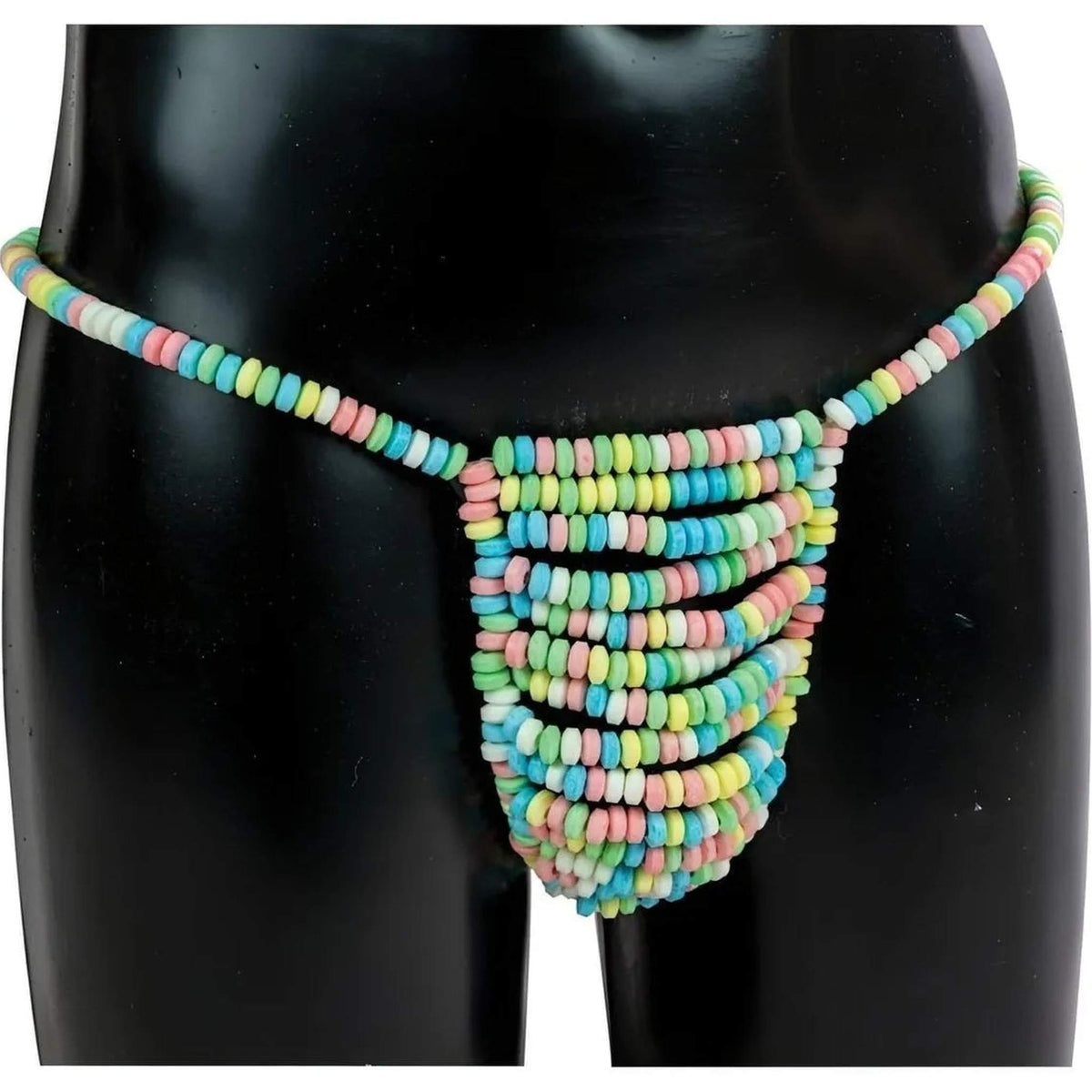 Tanga da uomo commestibile Candy Posing Pouch su manichino nero caramelle multicolori