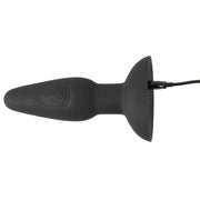Plug anale nero in silicone con cavo di ricarica collegato e motivo a spirale laterale