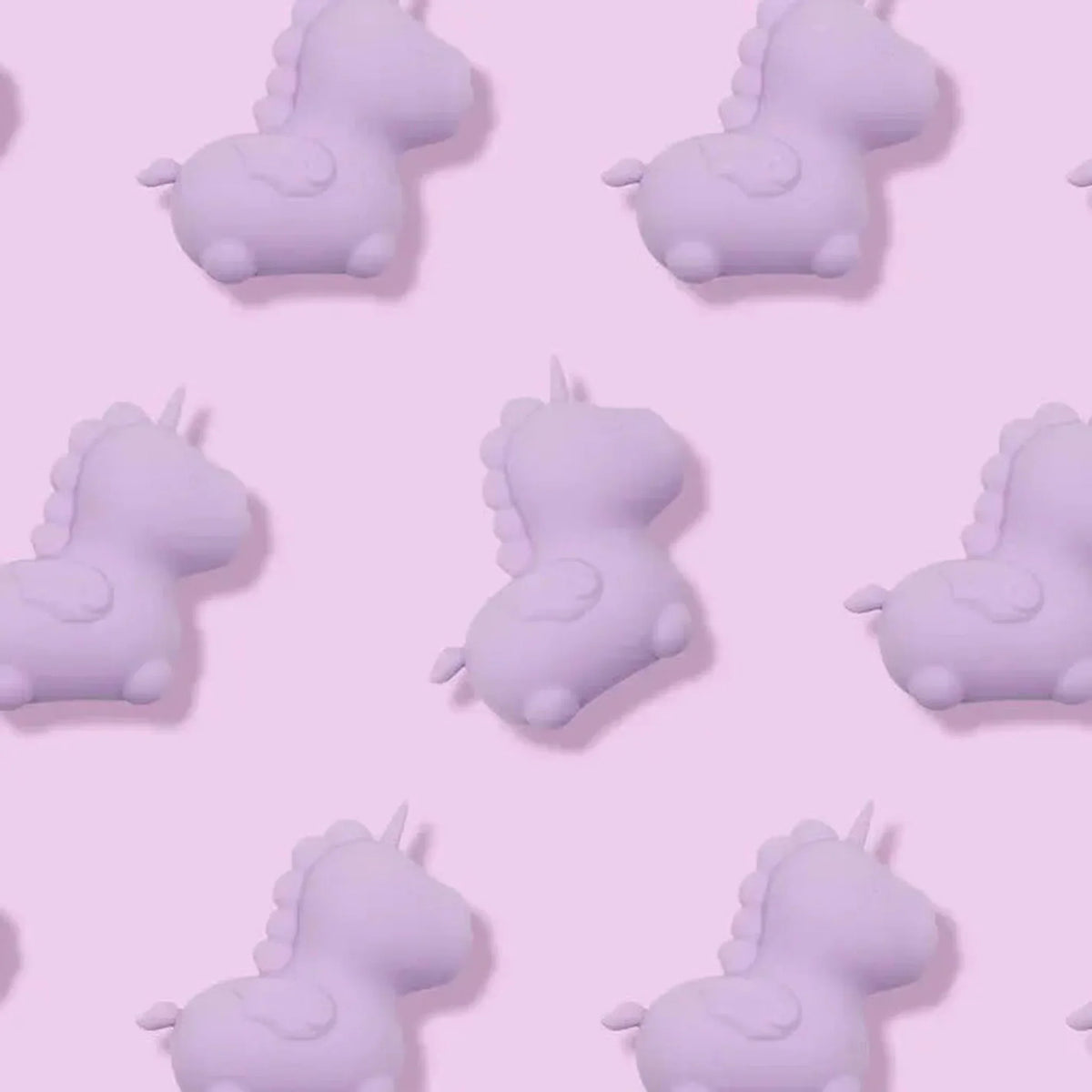 Packshot vibratore clitorideo lilla Unihorn Karma Unicorno in disposizione griglia