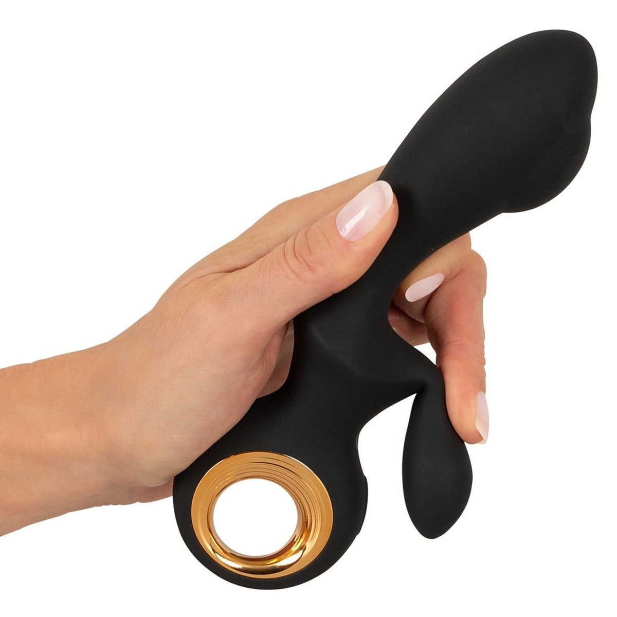 Vibratore a coniglio nero in silicone mostrato in mano con finitura liscia e anello dorato
